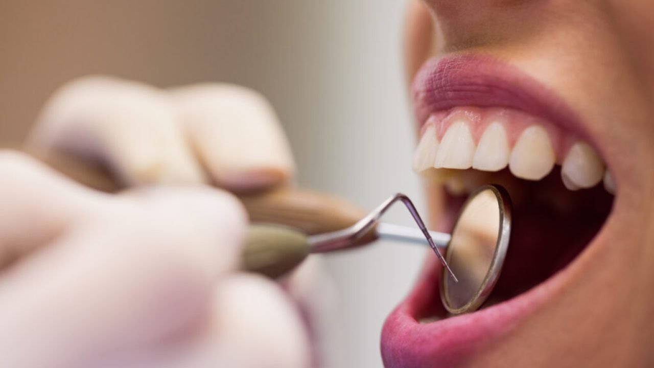 1786588265_dentist-examining-female-patient-with-tools-1024x683.jpg