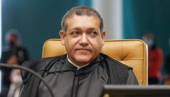 Ministro Nunes Marques durante sessão solene de posse no STF.