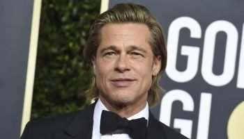 Mulher esperava Brad Pitt no aeroporto de Erechim — Foto: Foto: Jordan Strauss/A